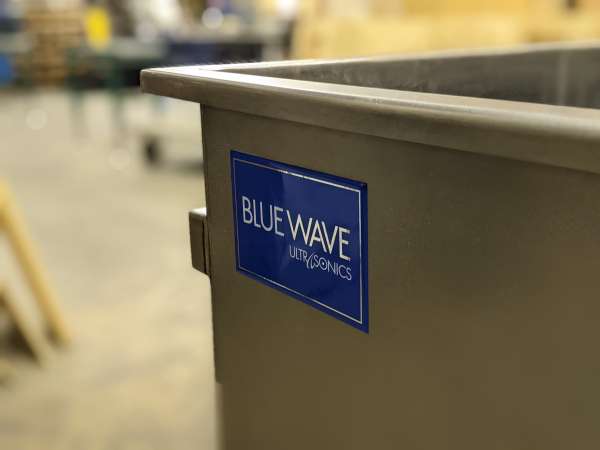 Bluewave ultrasonics sticker on stainless steel sink