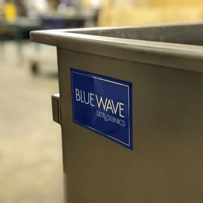 Blue Wave ultrasonics sticker on a stainless steel cleaning system