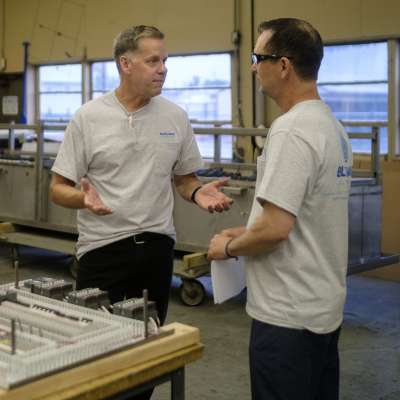 Two men talking vigorously