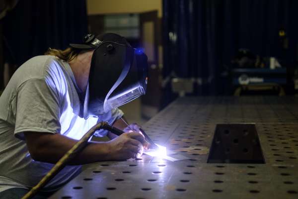 protective mask while sparks fly