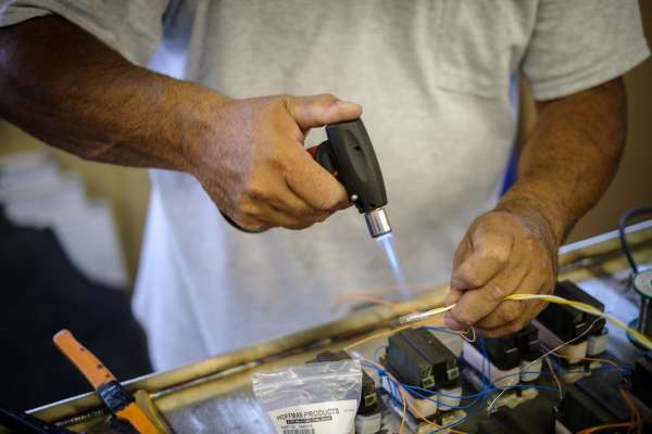 hand using fire tool