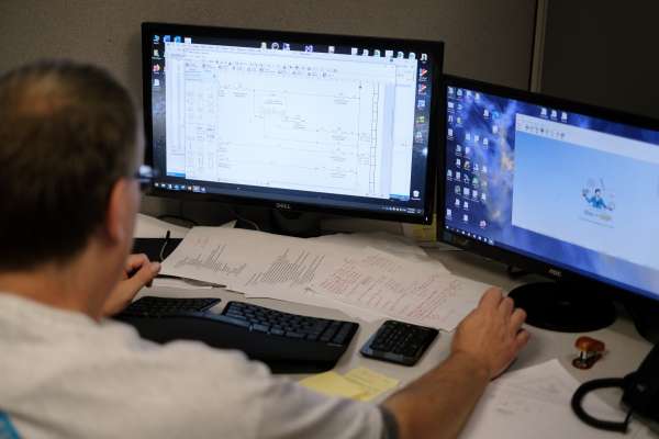 over shoulder showing data on screen